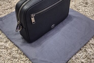 Kozna torbica Cristian Dior